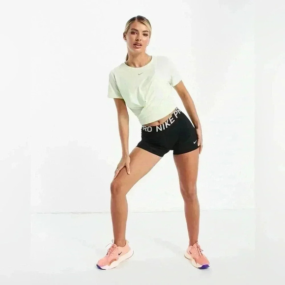 Nike Training One Luxe twist front short sleeve crop top in yellow size XS - Picture 2 of 6